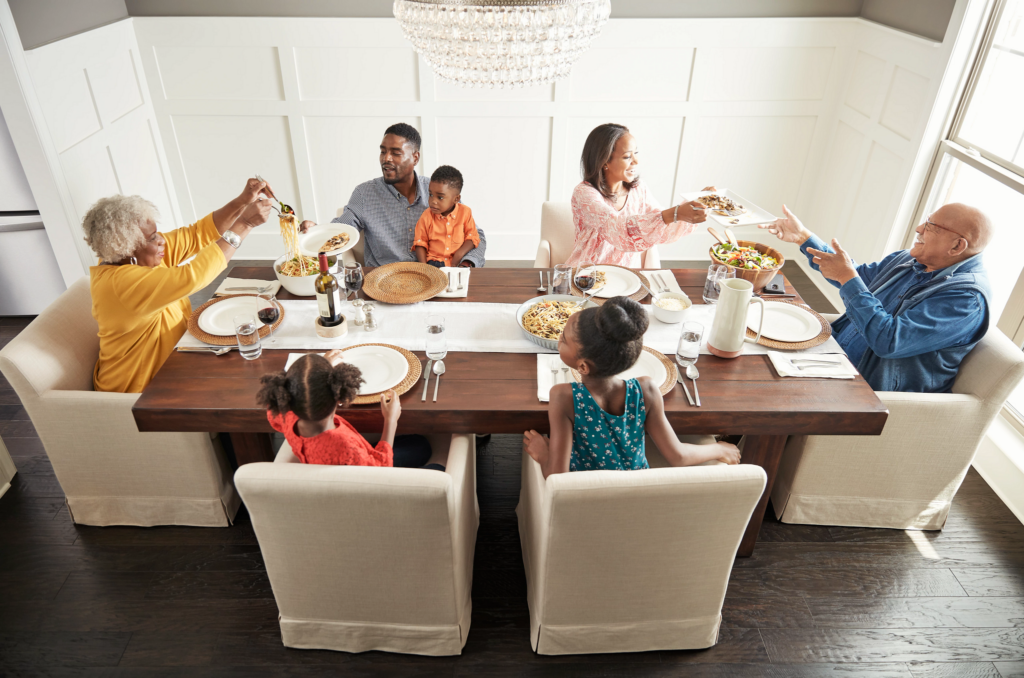 Family having breakfast at the dining table | Direct Carpet Unlimited